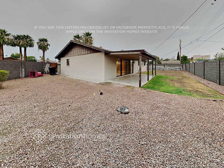 Building Photo - 8719 E Plaza Ave