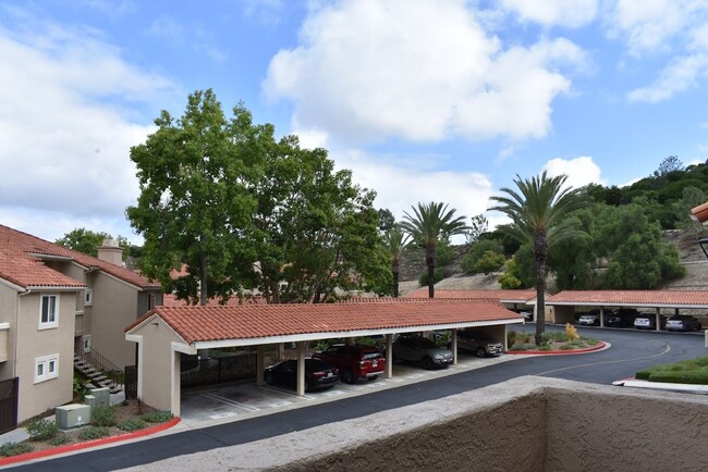 Building Photo - Unfurnished - Upgraded Condo -The Bluffs a...