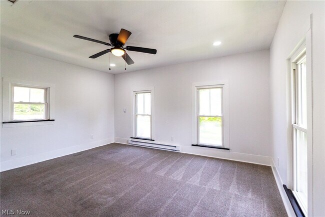 Building Photo - 8210 Maple Ave