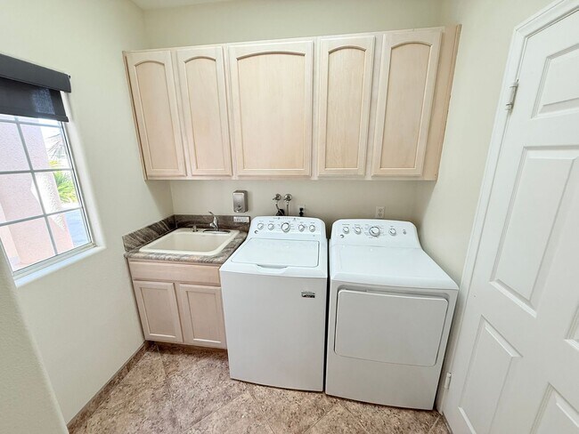 Building Photo - Spacious 4-Bedroom Home with Pool & Spa in...