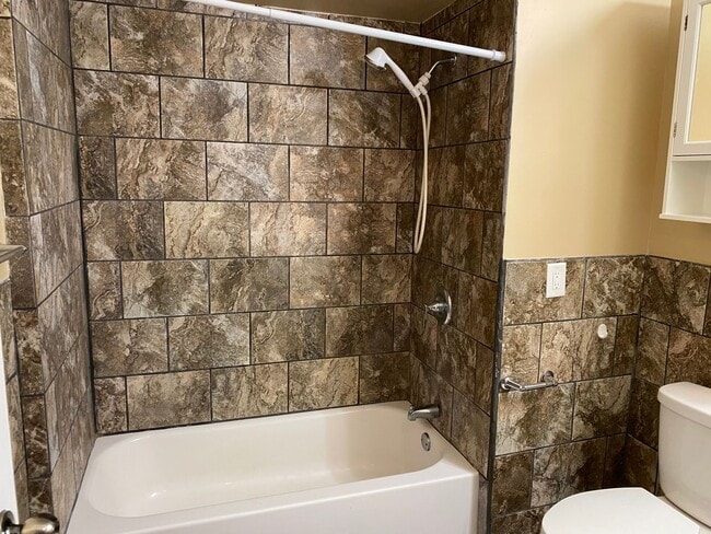 Building Photo - Check Out This Huge 4-Bedroom House!