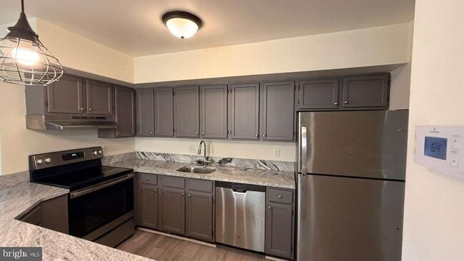 Building Photo - 8103 Greenspring Way