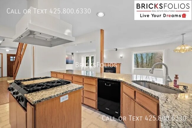 Building Photo - Welcome to Tukwila Haven – Open Concept Home Near Sound Transit!