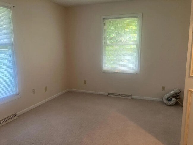 Building Photo - Beautiful Duplex Located in Serene, Wooded...