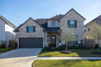 Building Photo - "Spacious Elegance: 4-Bedroom Retreat with...