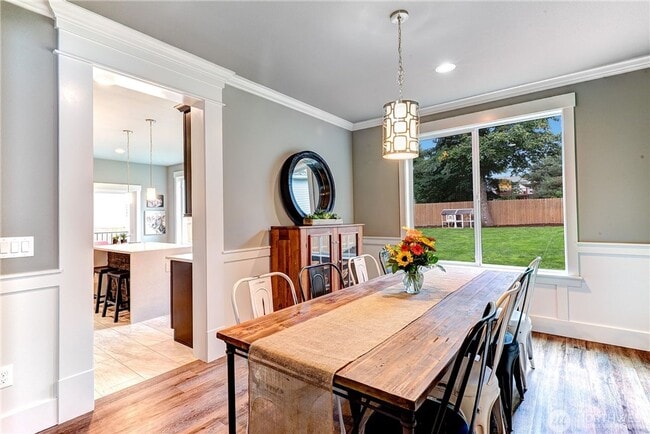 Building Photo - Luxury NW Living: 4 Bedroom Masterpiece with Dual Suites and Private Yard in Desirable Browns Point!