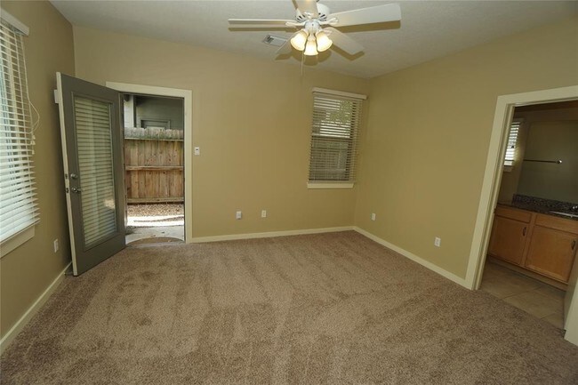 Building Photo - Elegant Gated Townhome Offering Unparallel...