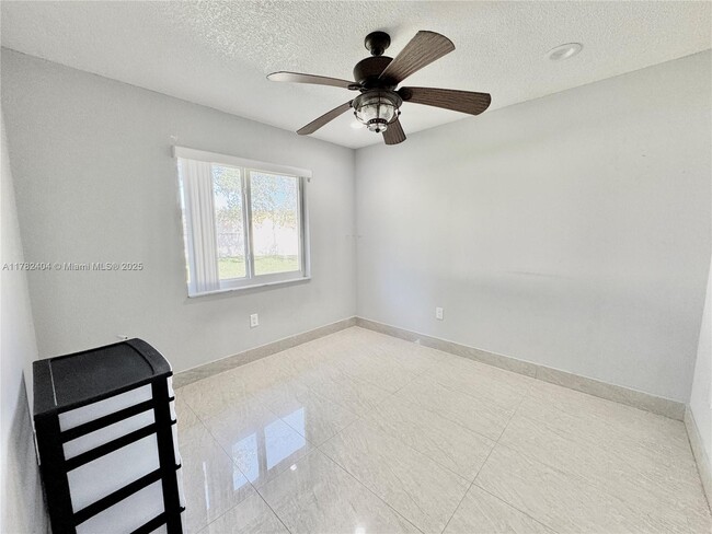 Building Photo - 10991 NW 30th Pl