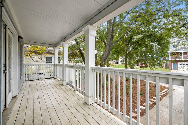 Private porch off the primary bedroom, perfect for relaxing and enjoying the outdoors - 247 Farrington Ave SE