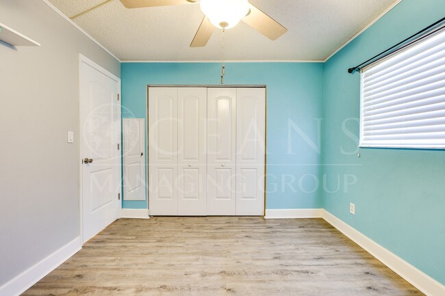 Building Photo - First Floor Riverfront Condo
