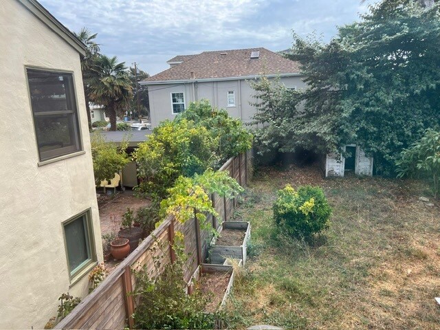 view of backyard from rear bedroom window - 1390 Dwight Way