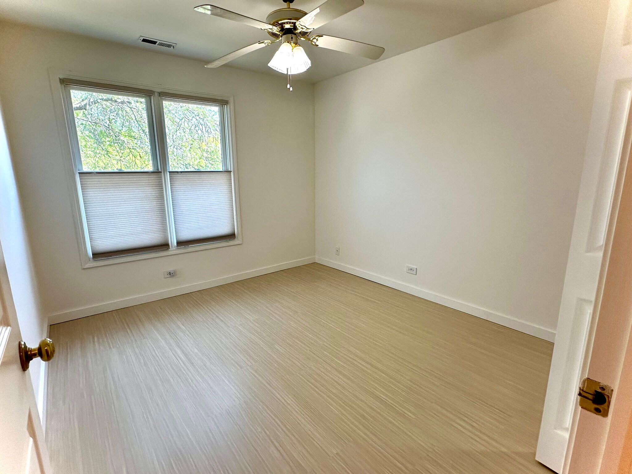 2nd bedroom. Bali double cellular shades provide insulation without blocking light. - 174 Hemingway Ct