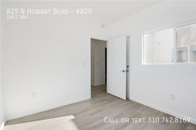 Building Photo - Luxe Living at 825 N. Hobart Blvd. – Where...