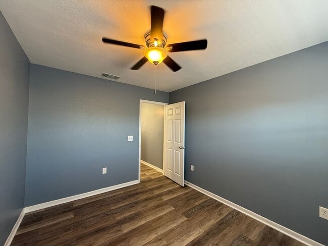 Building Photo - 65th Terrace N - Triplex