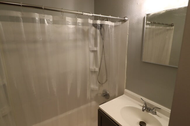 Building Photo - One Bedroom LOWER Duplex