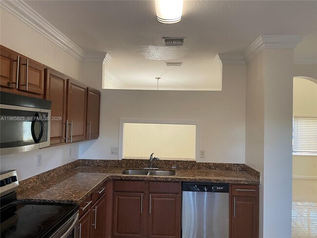 Building Photo - 12885 SW 49th Ct