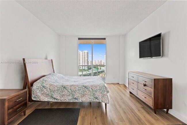 Building Photo - 19390 Collins Ave