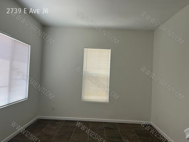 Building Photo - 2739 E Ave J6