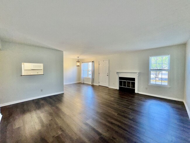 Building Photo - Just Updated & Ready NOW! A Pet Friendly H...