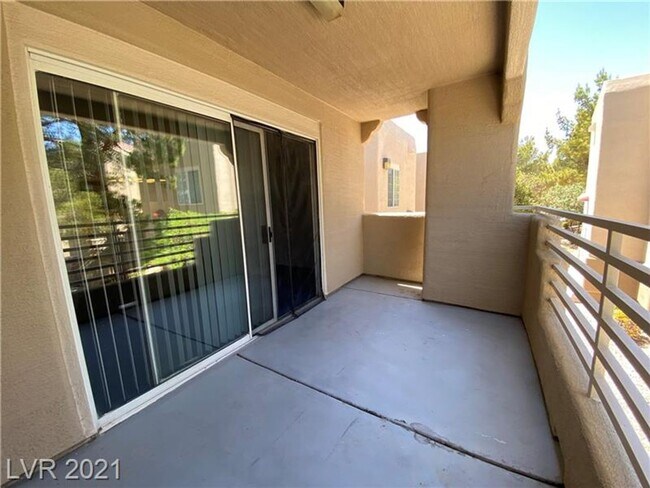 Building Photo - Cozy 1-Bed Condo in Gated 89128 Community ...
