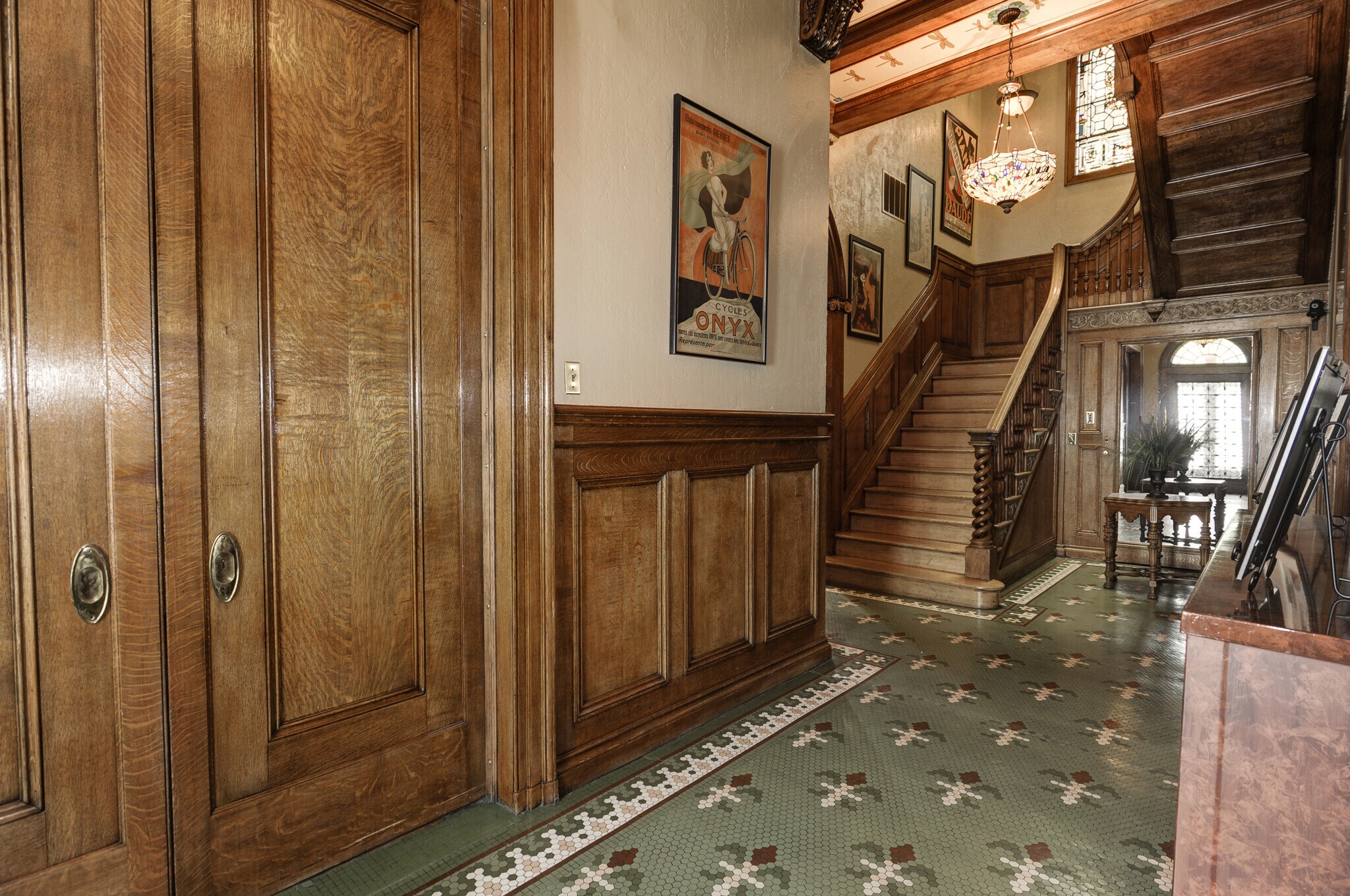 Stairs to 2nd level - 106 E Chase St