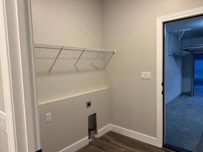 Building Photo - New Construction! West side location. 4br, 3bth, 2crg, Finished basement. All new stainless steel...