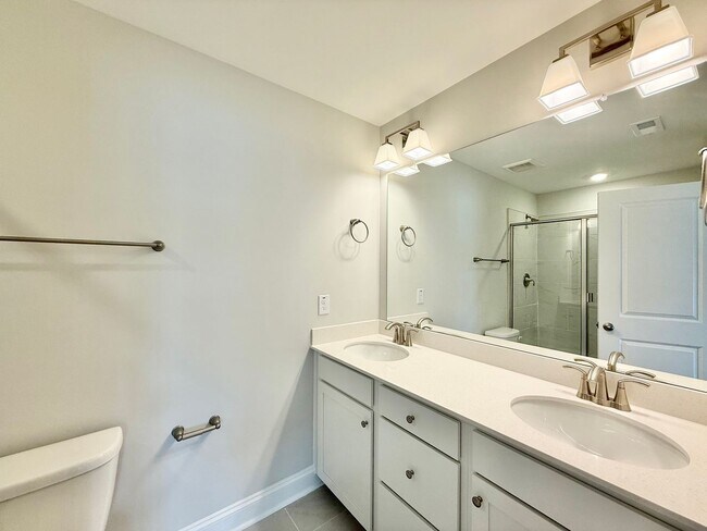 Building Photo - Stunning End Unit New Construction 3BD, 3....
