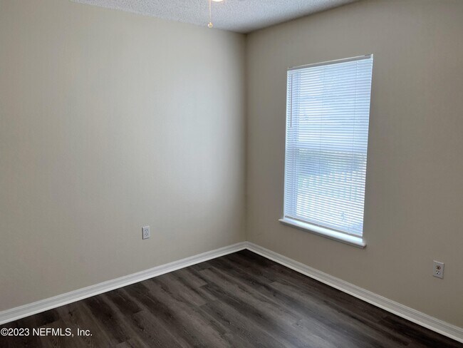 Building Photo - 6580 Gentle Oaks Dr N