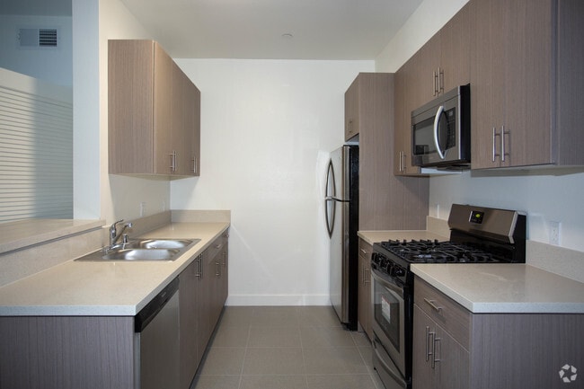 3BR, 2BA-1200 SF - MONARCH APARTMENTS
