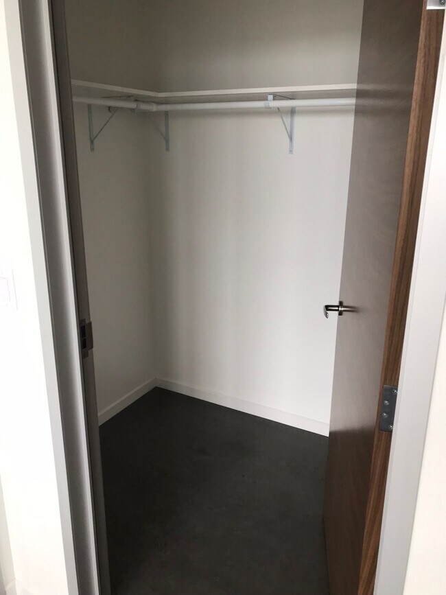 Building Photo - AVAILABLE AUGUST 2026 - Downtown Iowa City High-Rise Condo with Amazing Views