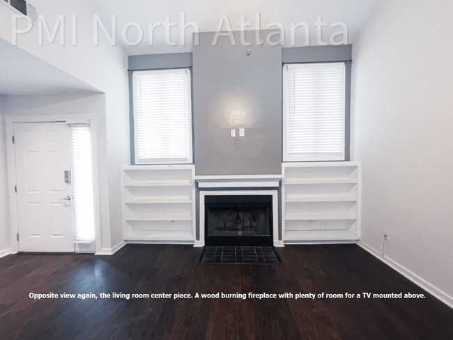 Building Photo - Pet Friendly End Unit!