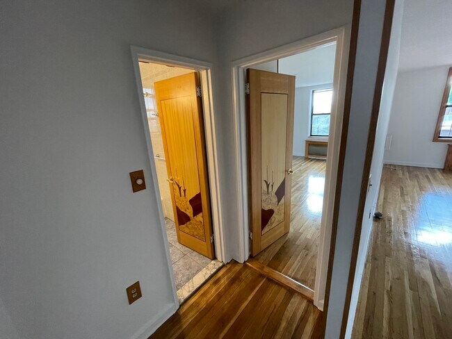 View into bathroom and bedroom - 67-30 Dartmouth St