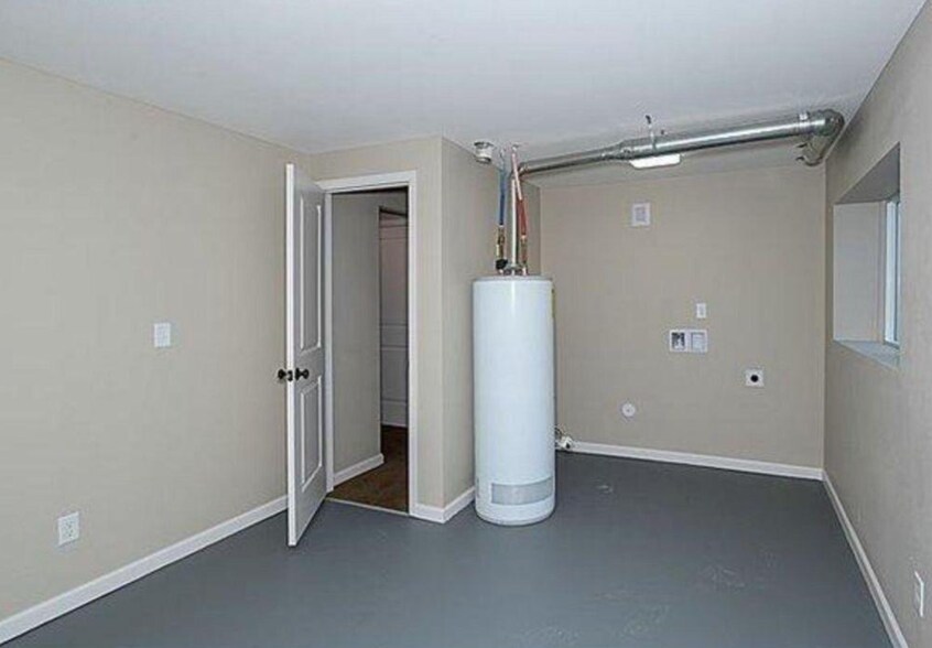 Large laundry with installed washer and dryer - 5019 W 34th Ave