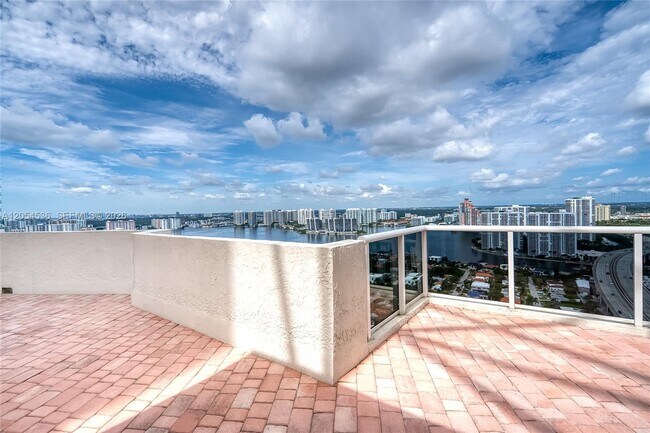 Building Photo - 19111 Collins Ave