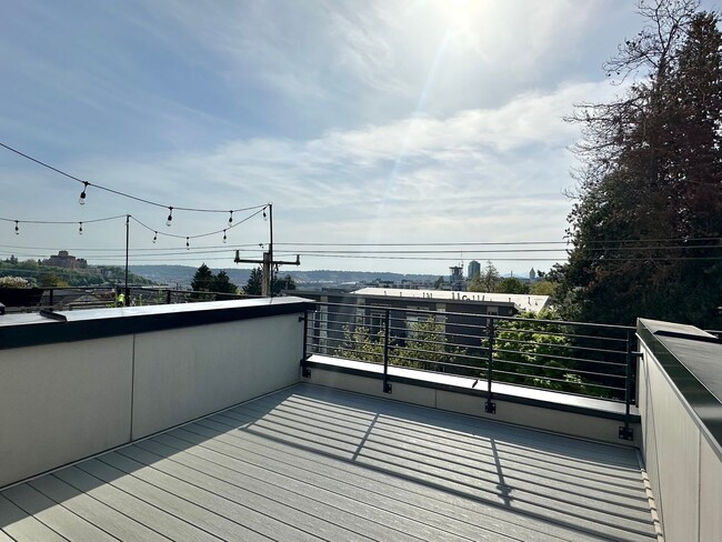 Building Photo - Modern home w/rooftop deck in desired Cher...