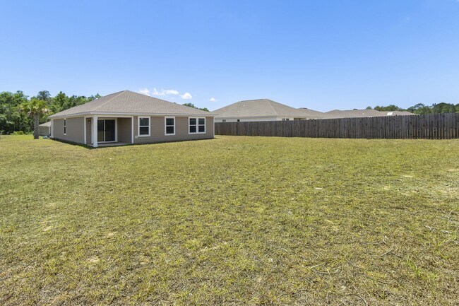 Building Photo - Beautiful 4/2 home with NEW fenced yard