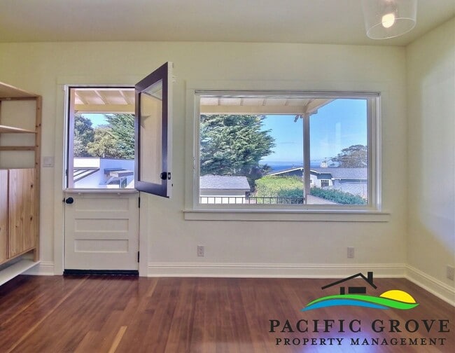 Building Photo - Classic Pacific Grove Charm with Bay Glimpses & Light-Filled Living