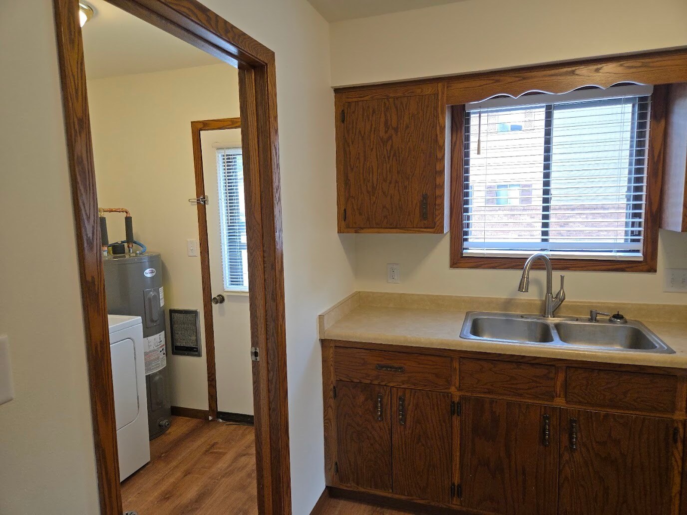 Kitchen into laundry with private entrance - 141 Maple Ave S