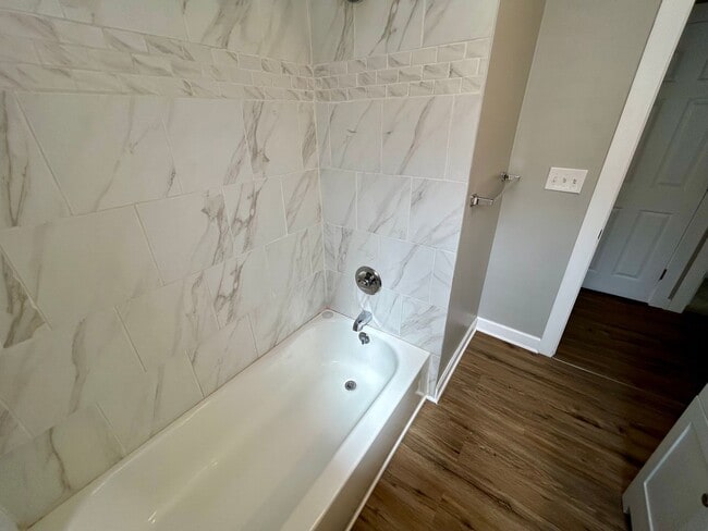 Building Photo - DELHI TWP- Spacious 4 bedroom 3 bath Cape Cod with garage