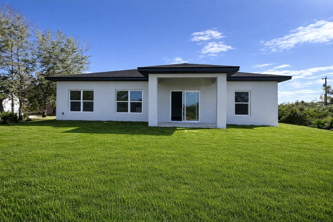 Building Photo - BRAND NEW Modern 4BR/2BA Home with Garage – Peaceful Lake Placid Retreat