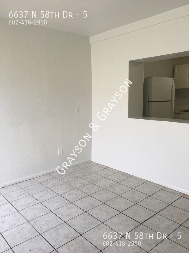 Building Photo - 6637 N 58th Dr