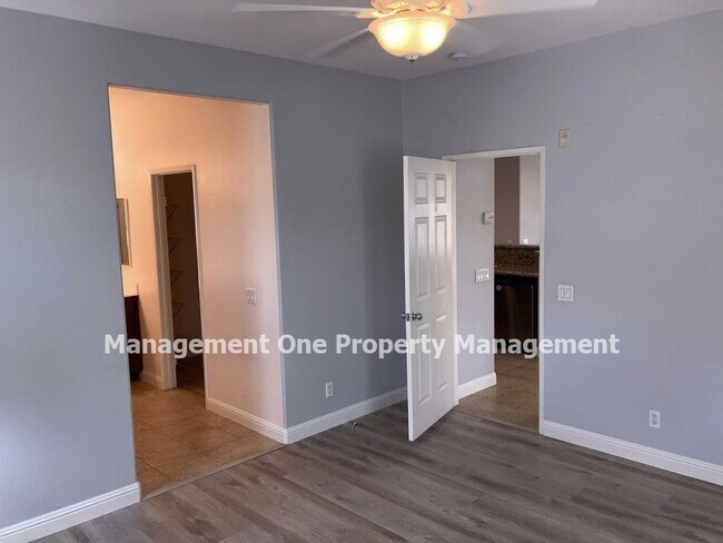 Building Photo - Beautiful Serafina Gated Community Townhome