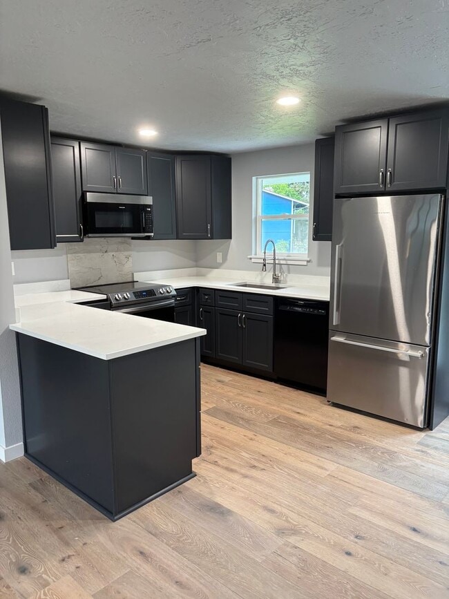 Building Photo - 3 Bed Home with Yard, Garage + In-Unit W/D