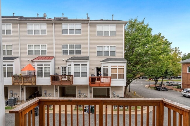 Building Photo - COMING SOON - Great 4 level end unit TH in...