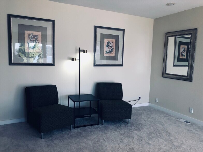 main bedroom chairs & table with charging station - 7107 120th St NW