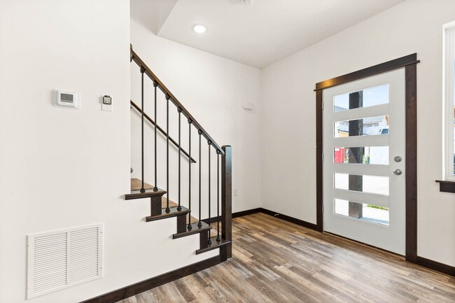 Building Photo - 2-Story Urban Triplex at a modern communit...