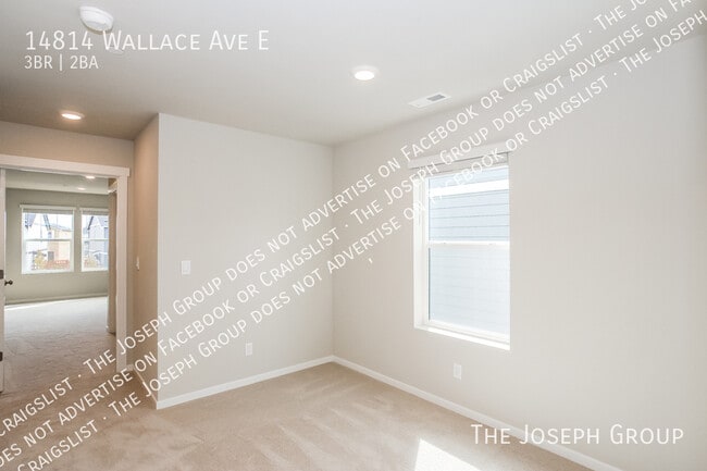 Building Photo - 14814 Wallace Ave E