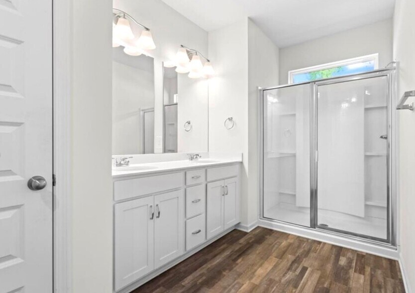 Primary Bath with double sinks and large walk-in shower - 136 Grant Dr