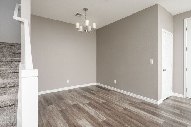 Building Photo - Modern Henderson Townhome with Loft & Resort-Style Amenities