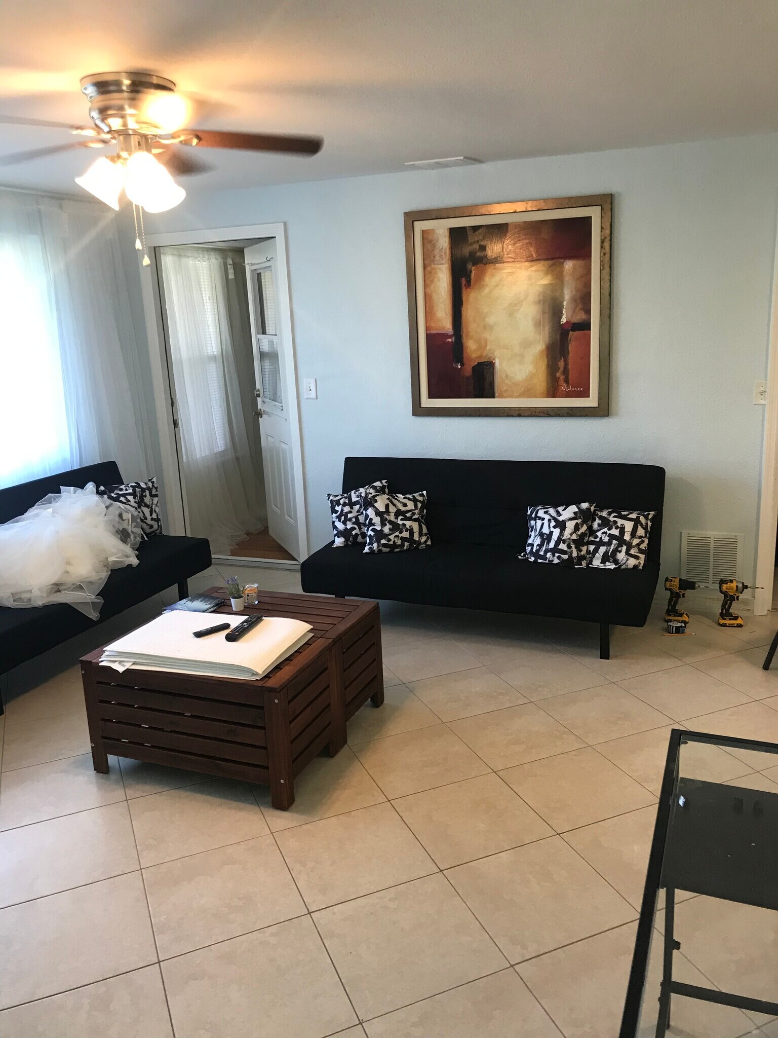 living room with private set up to the 3rd bedroom - 2440 Manasota Beach Rd